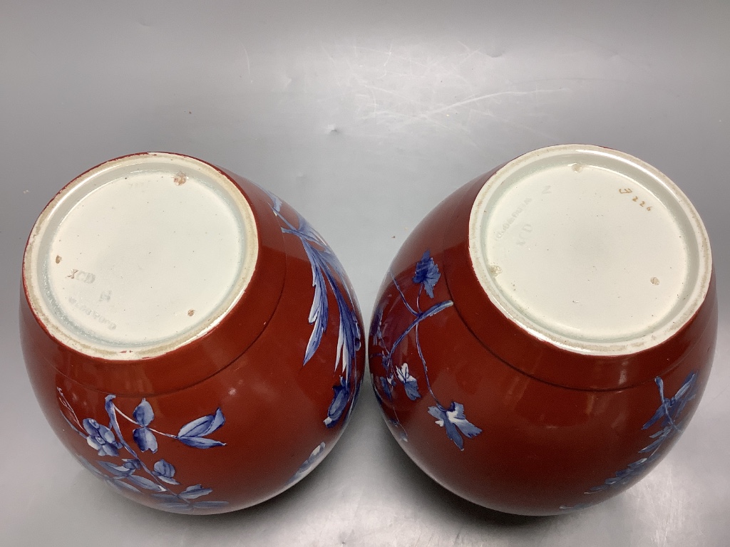 A pair of Victorian Wedgwood vases and covers 25cm